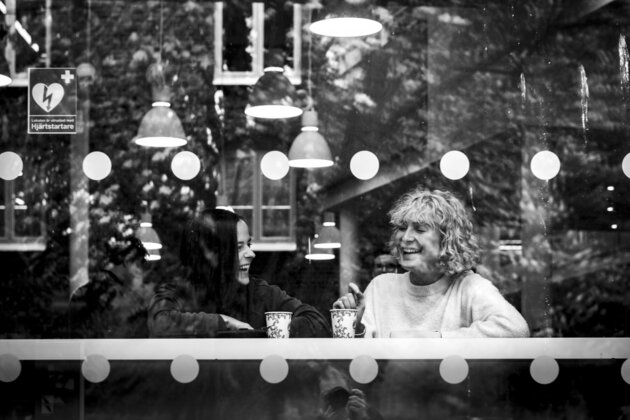 Two woman taking a coffee break