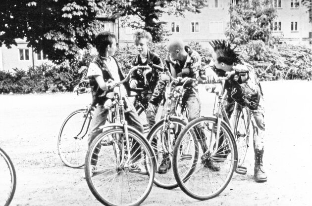 Punk rockers with bikes
